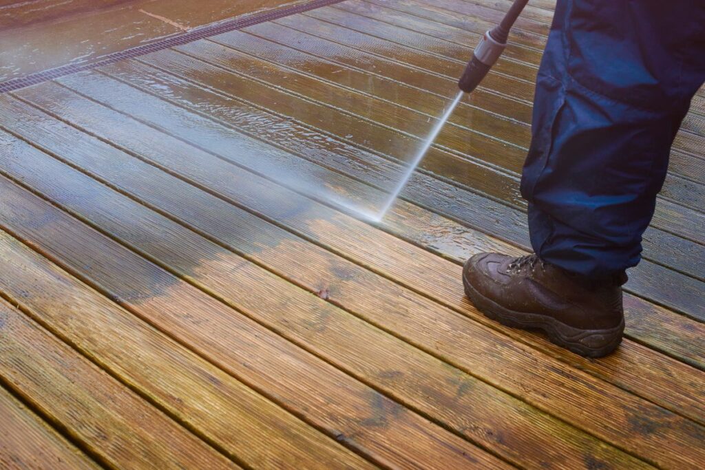 Deck cleaning showing very clean area already finished and ares yet to be cleaned